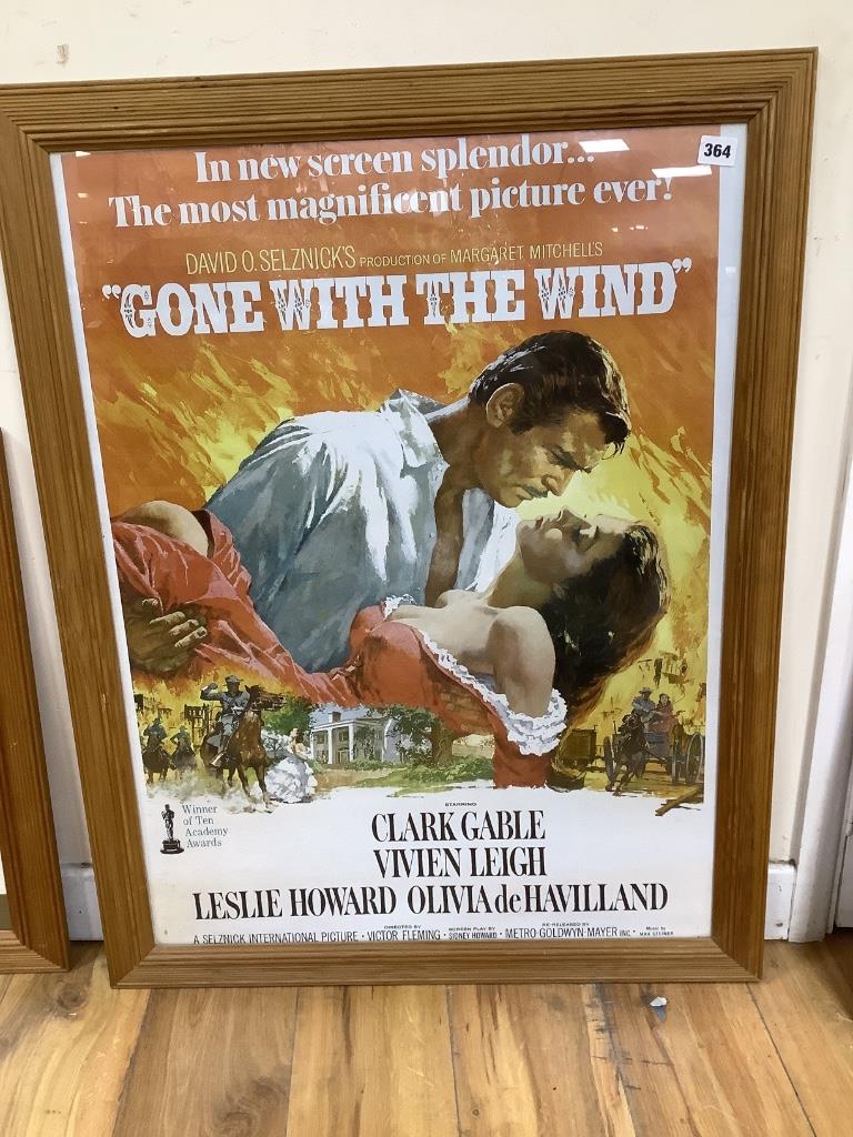 Two framed film posters: Breakfast and Tiffanys and Gone with The Wind